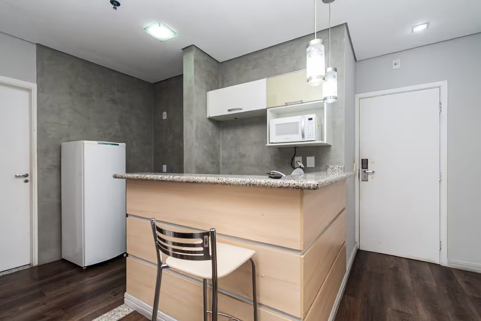 Interior e varanda do apartamento The Standard